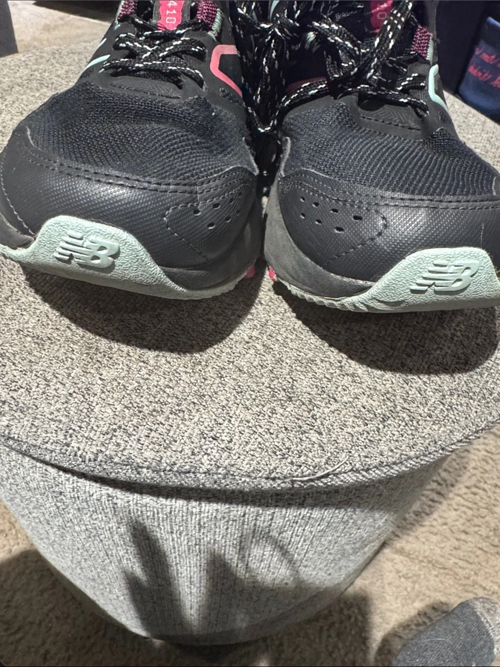 New Balance Women’s Black Athletic Sneakers with Pink and Teal Accents